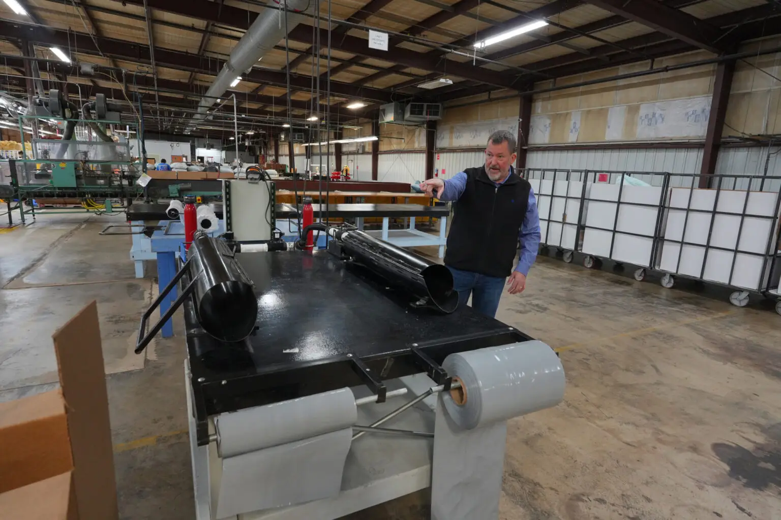 Automated CNC routing and water-jet machinery operating inside HLJ Foam's manufacturing facility.