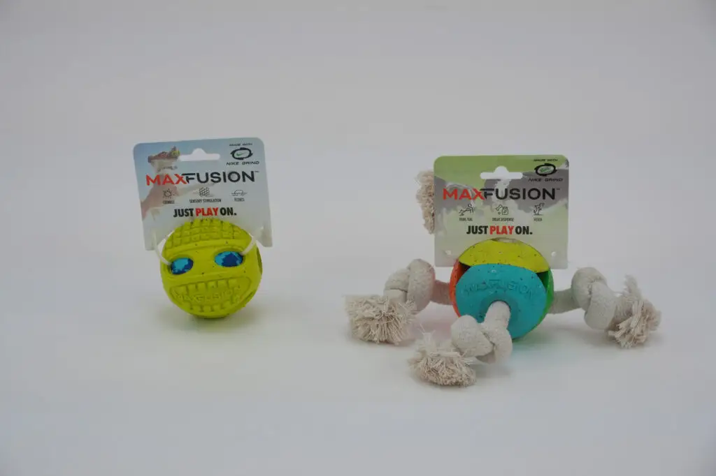 MaxFusion foam dog toys including a yellow ball and rope chew toy in retail packaging.